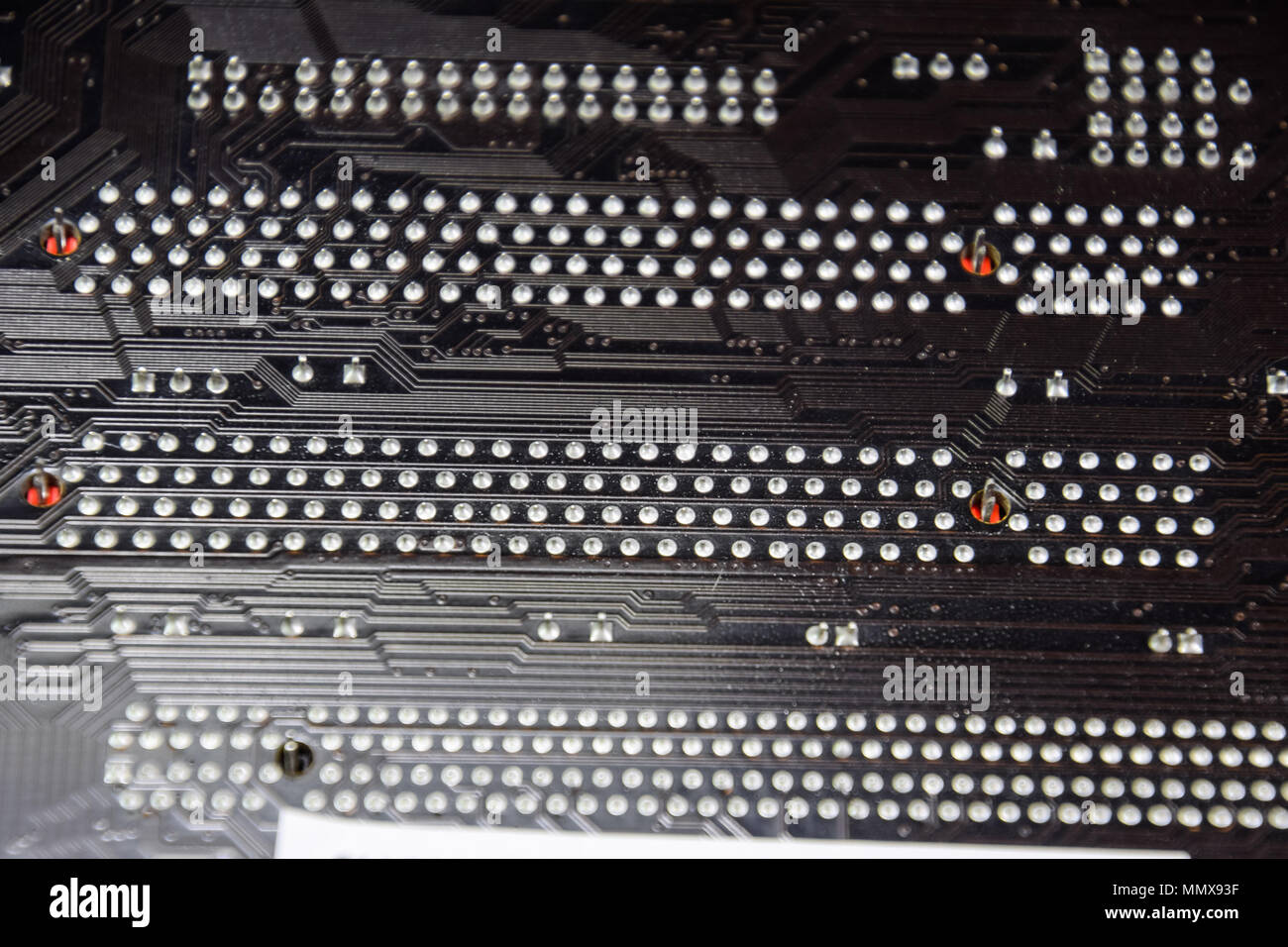 The reverse side of the microboard. Contacts solder. Soldered parts. Electronic board with