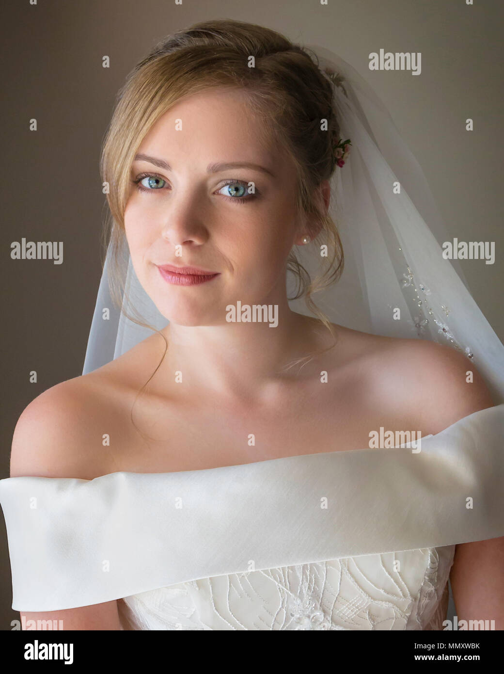 a young bride looking at camera Stock Photo