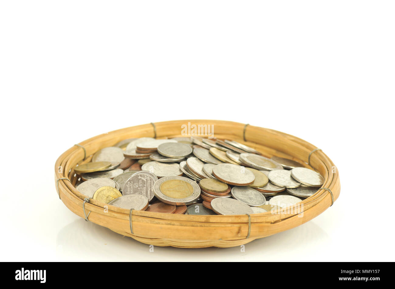 coins money in basket isolated and white background Stock Photo Alamy