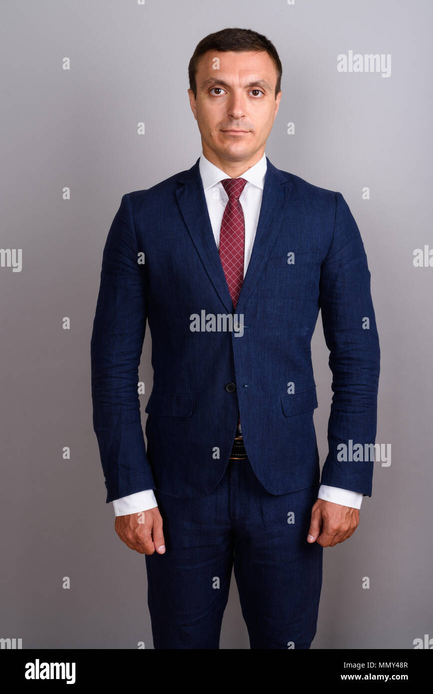 Businessman wearing gray suit hi-res stock photography and images - Alamy
