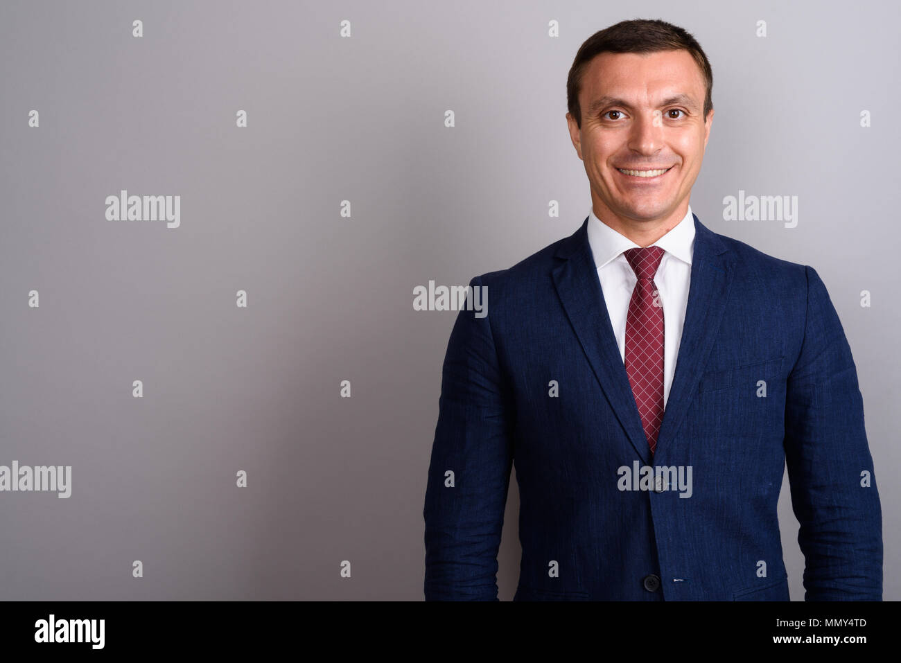 Businessman wearing gray suit hi-res stock photography and images - Alamy