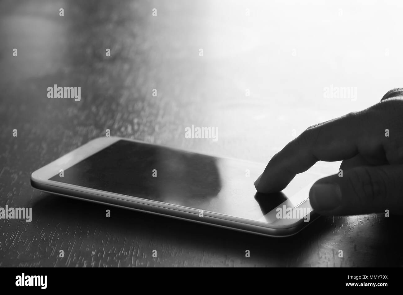 Business hand holding smartphone Black and White Stock Photos & Images ...