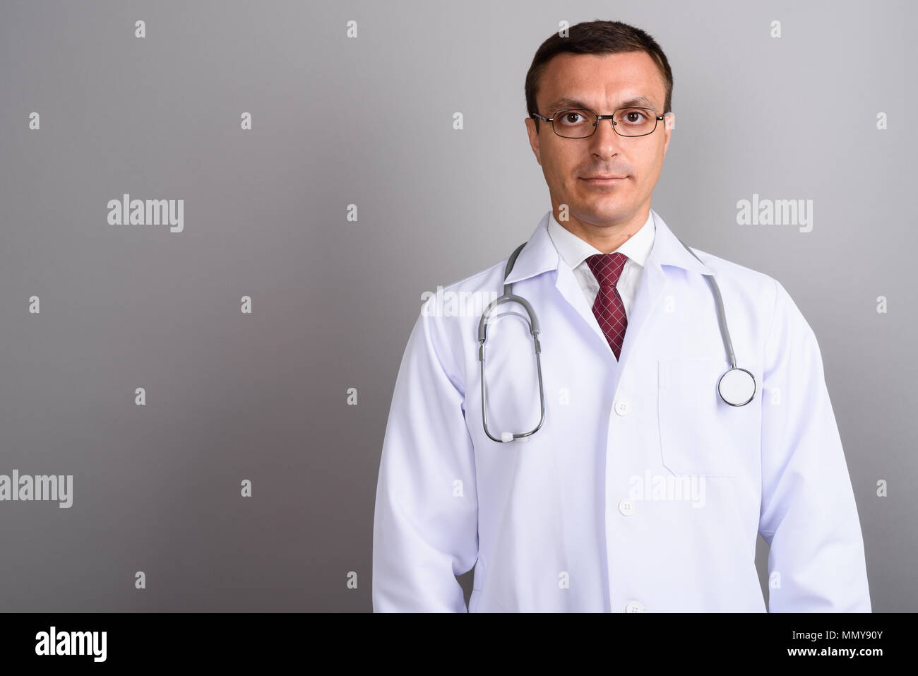 Doctor man wearing stethoscope hi-res stock photography and images - Alamy