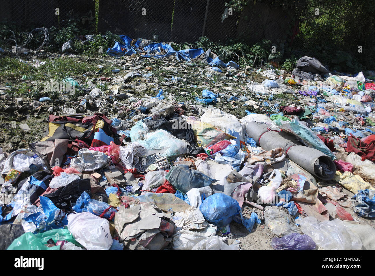 Fly tipping of rubbish all kinds in a country lane, Kathmandu, Nepal