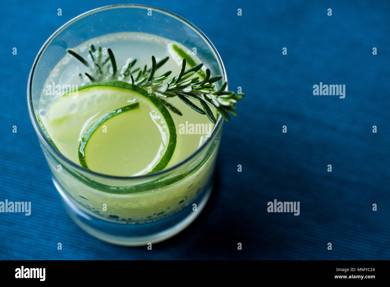 Rosemary Gin Gimlet Cocktail with Cucumber Slice. Beverage Concept