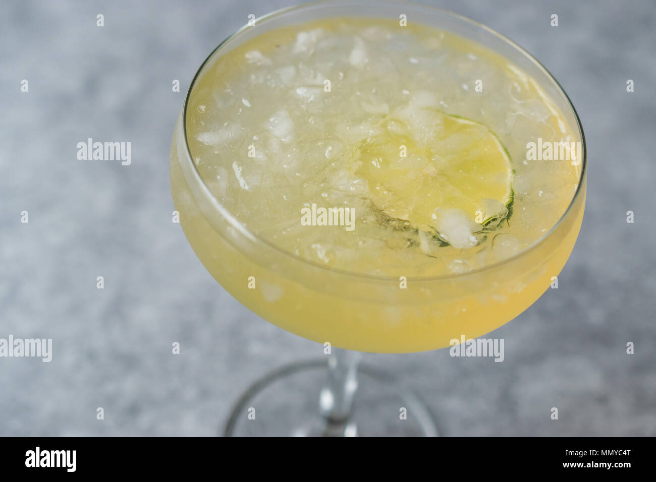 Gin Gimlet Cocktail with Lime and Crushed Ice. Beverage Concept Stock
