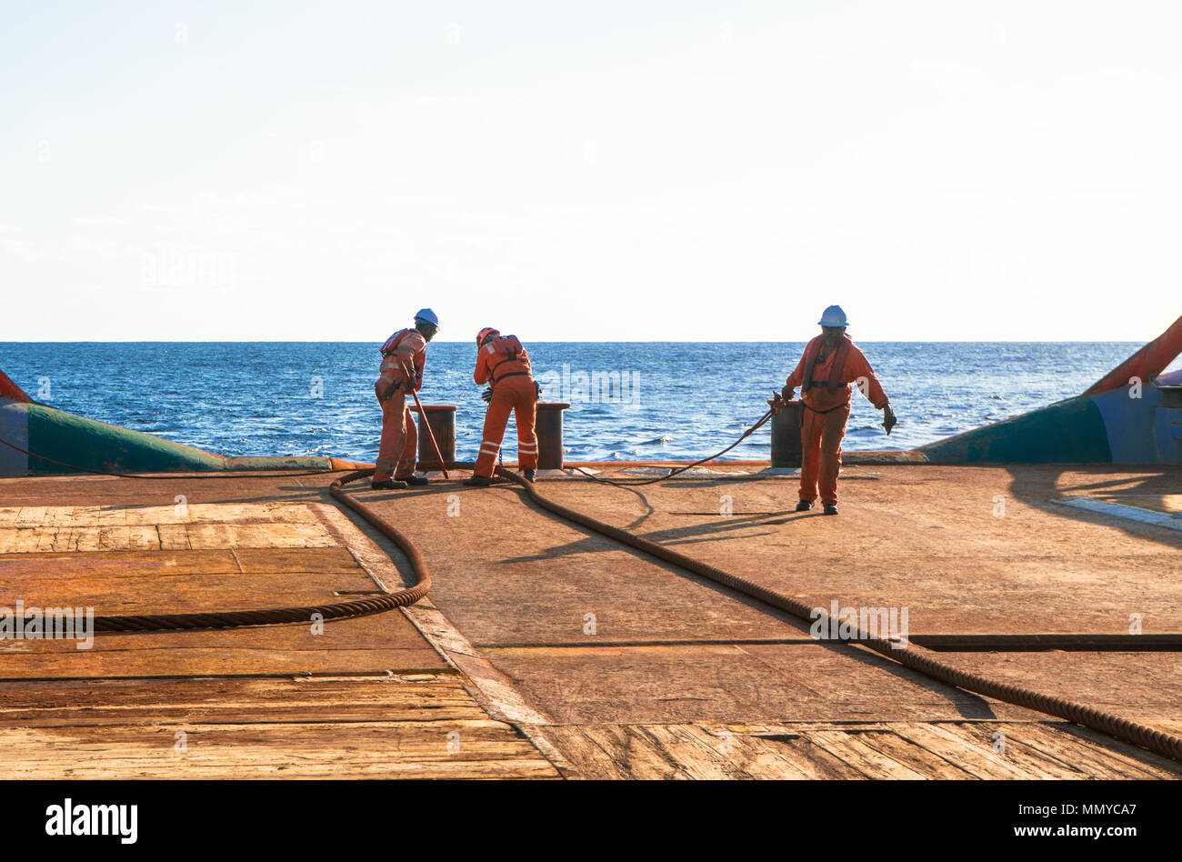 Anchorhandling Tug Supply AHTS vessel crew preparing vessel for static