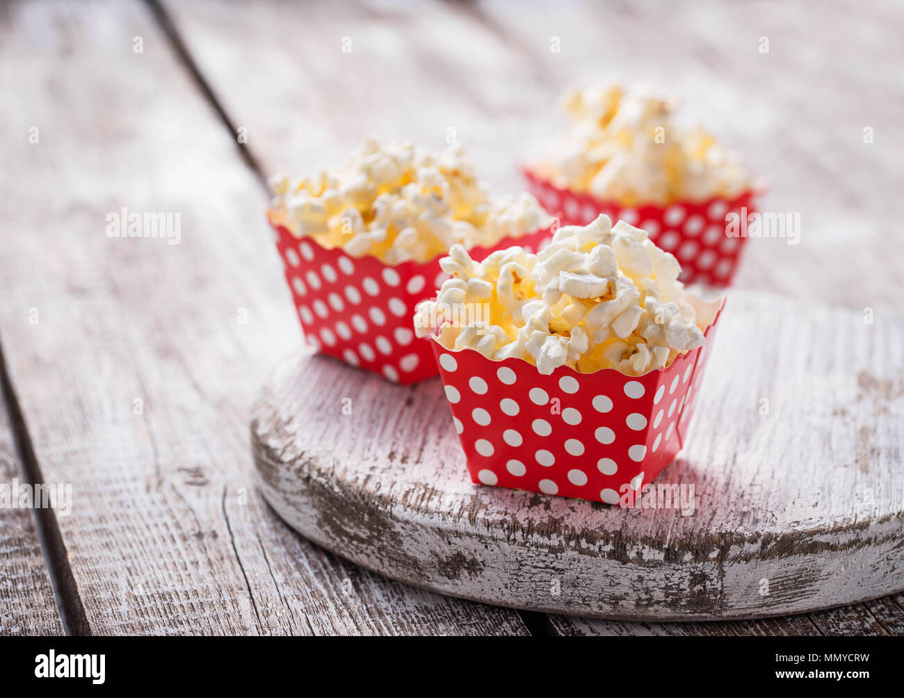 Popcorn in red polka dot pack  Stock Photo