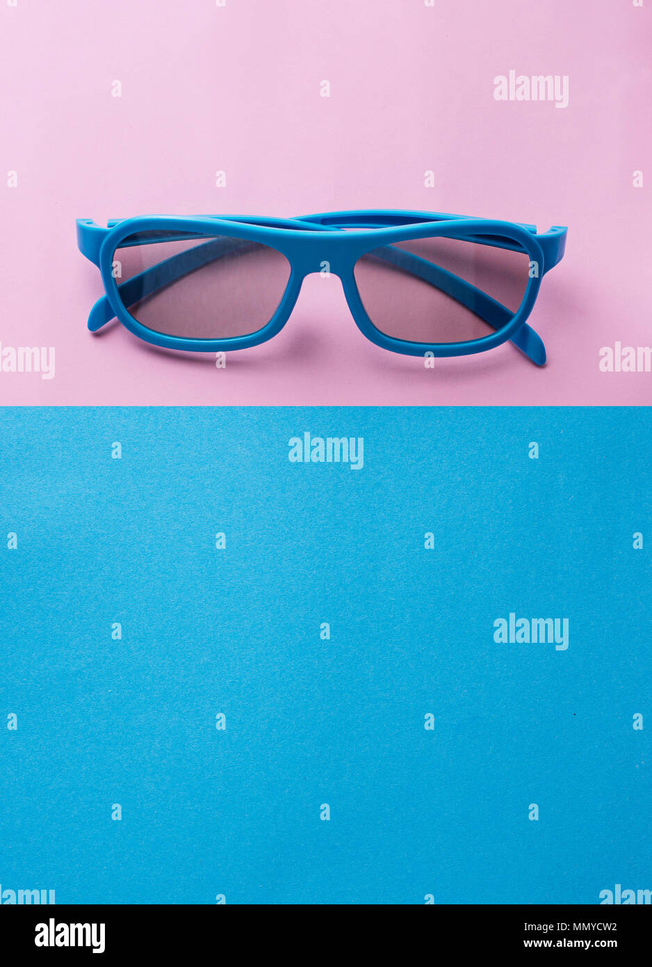 Sunglasses on blue and pink background Stock Photo