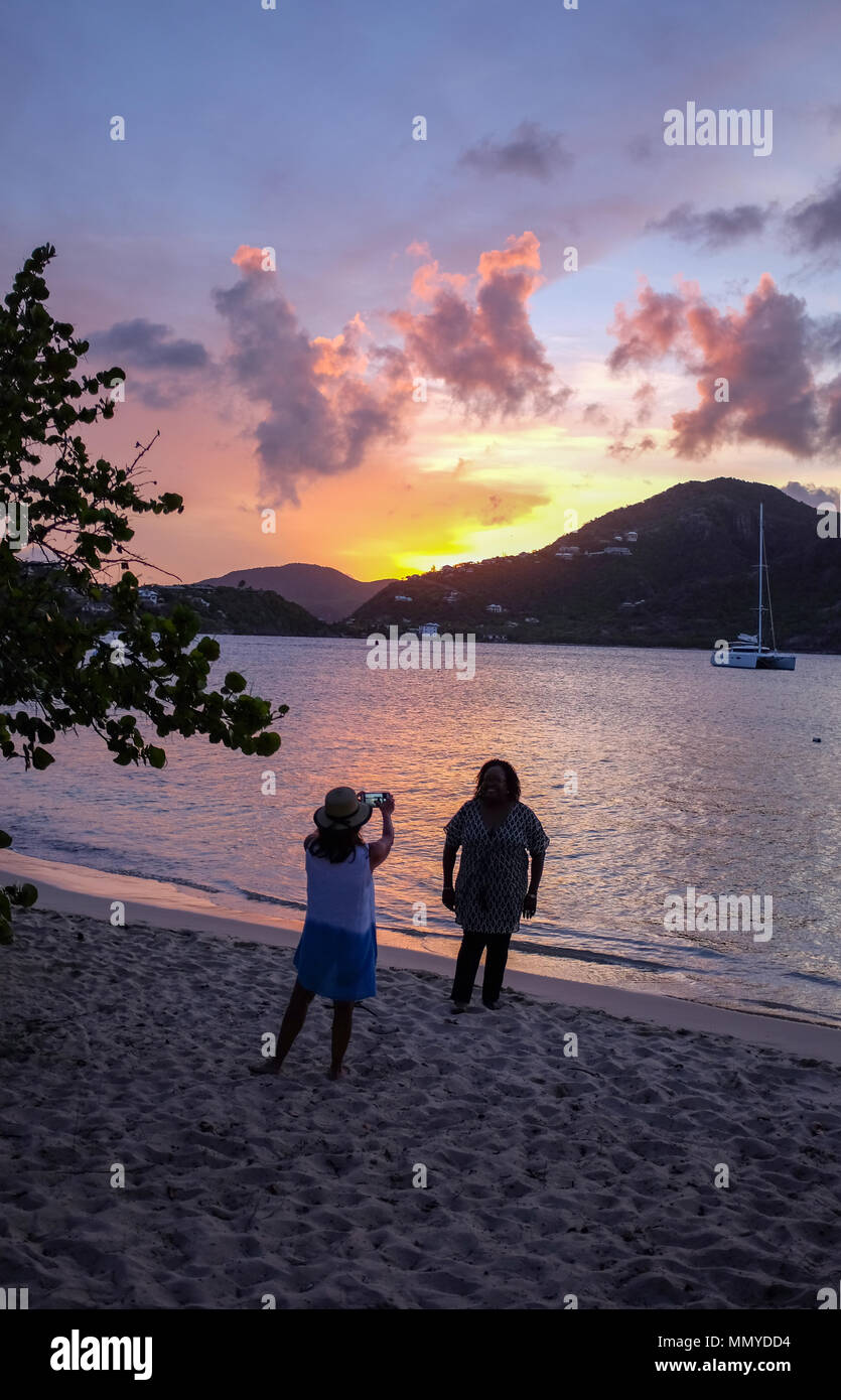 Antigua Lesser Antilles islands in the Caribbean West Indies - Beautiful sunset at  Catherines cafe restaurant Pigeon Point Beach Stock Photo