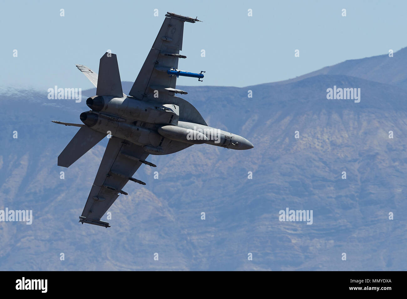 Close Up Photo Of A US Navy F/A-18E Super Hornet Jet Fighter Flying Diving Into Panamint Valley, California, USA. Stock Photo