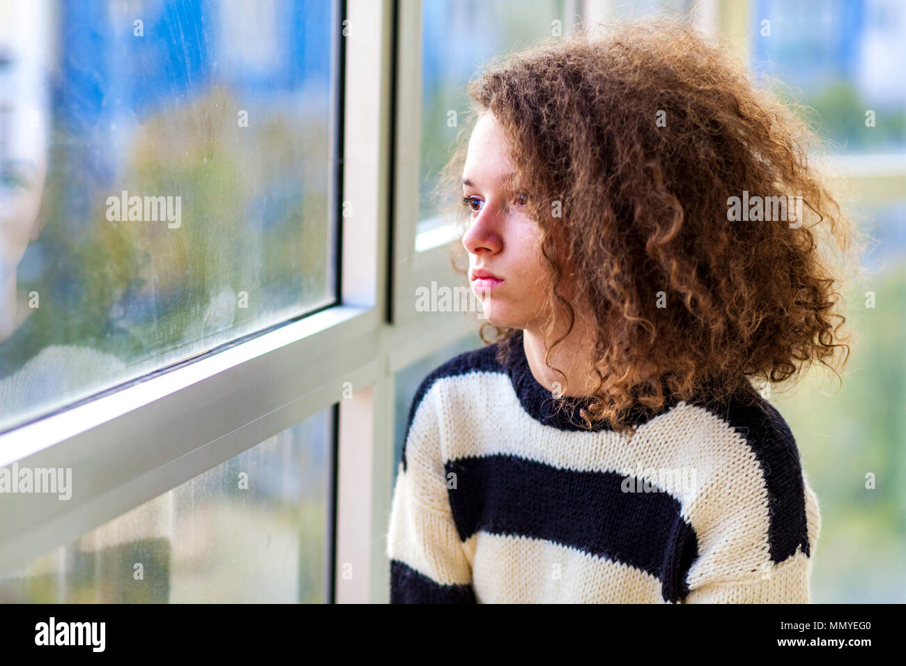Cute teen girl sitting hi-res stock photography and images - Alamy