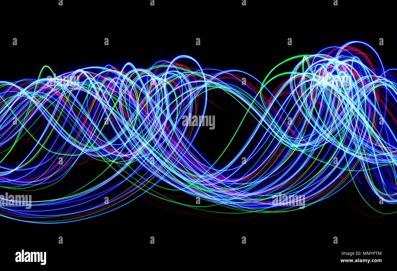 Multi color light painting photography, electric blue, red and green ...