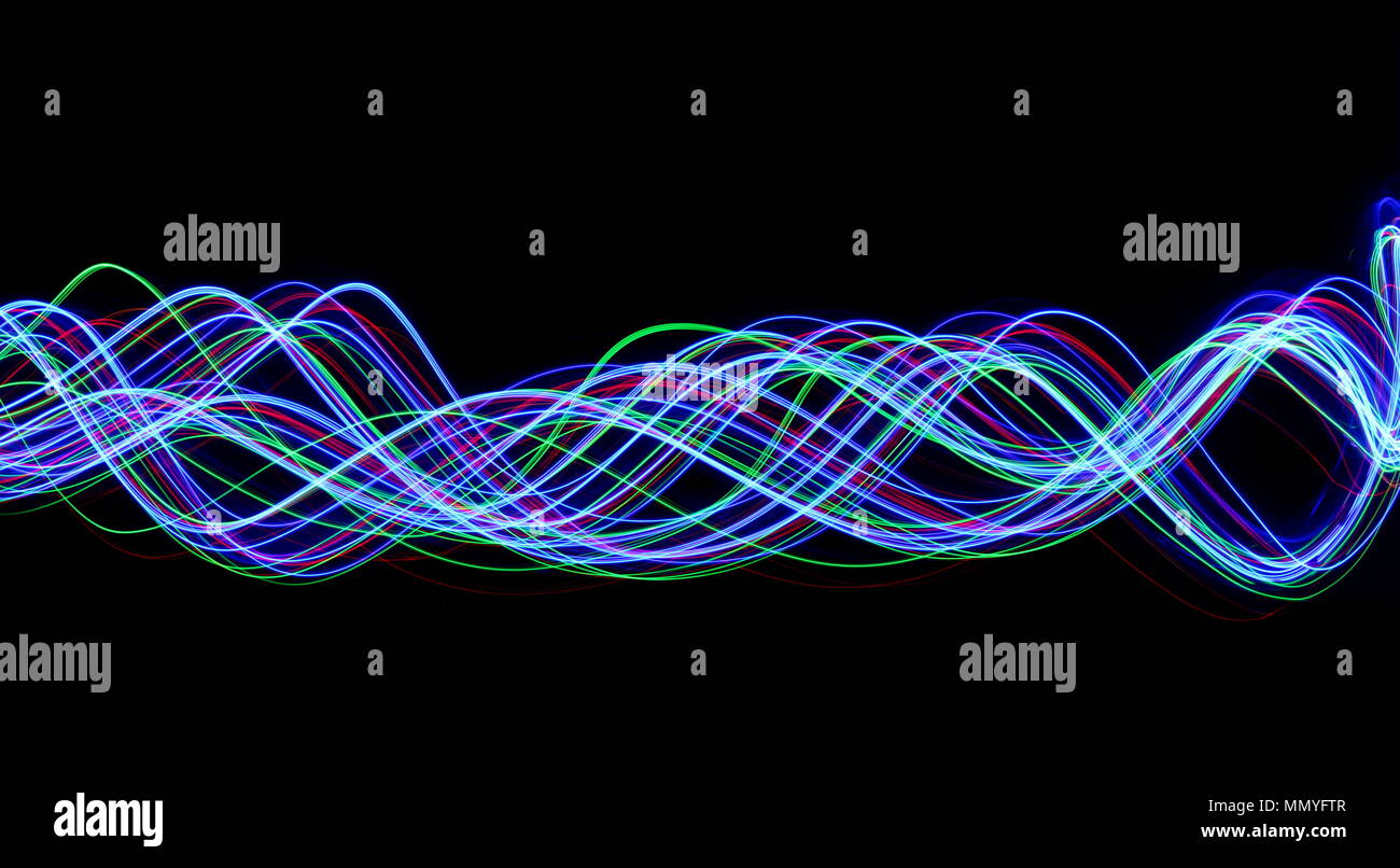 Multi color light painting photography, electric blue, red and green ...