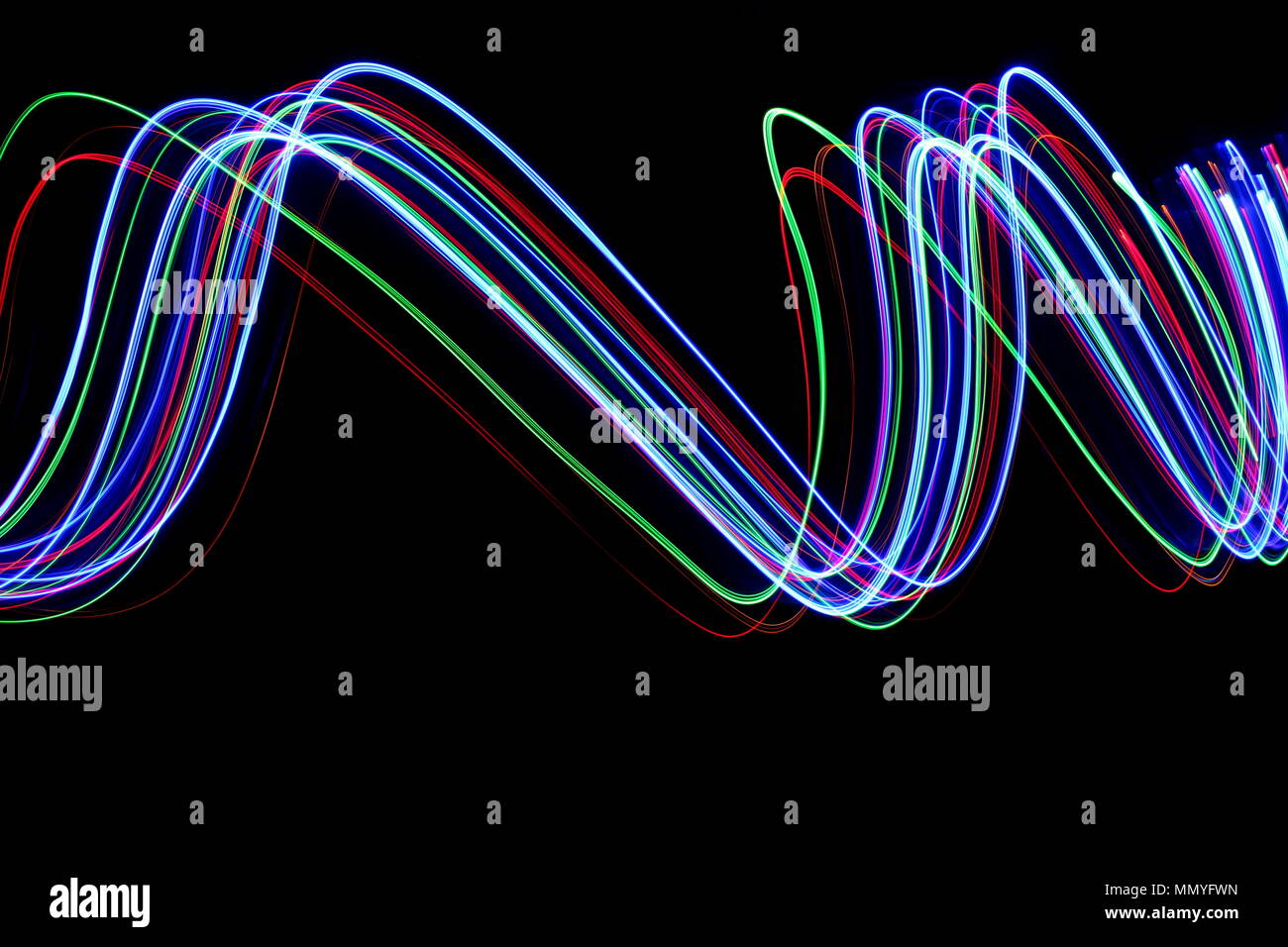 Multi color light painting photography, electric blue, red and green ...