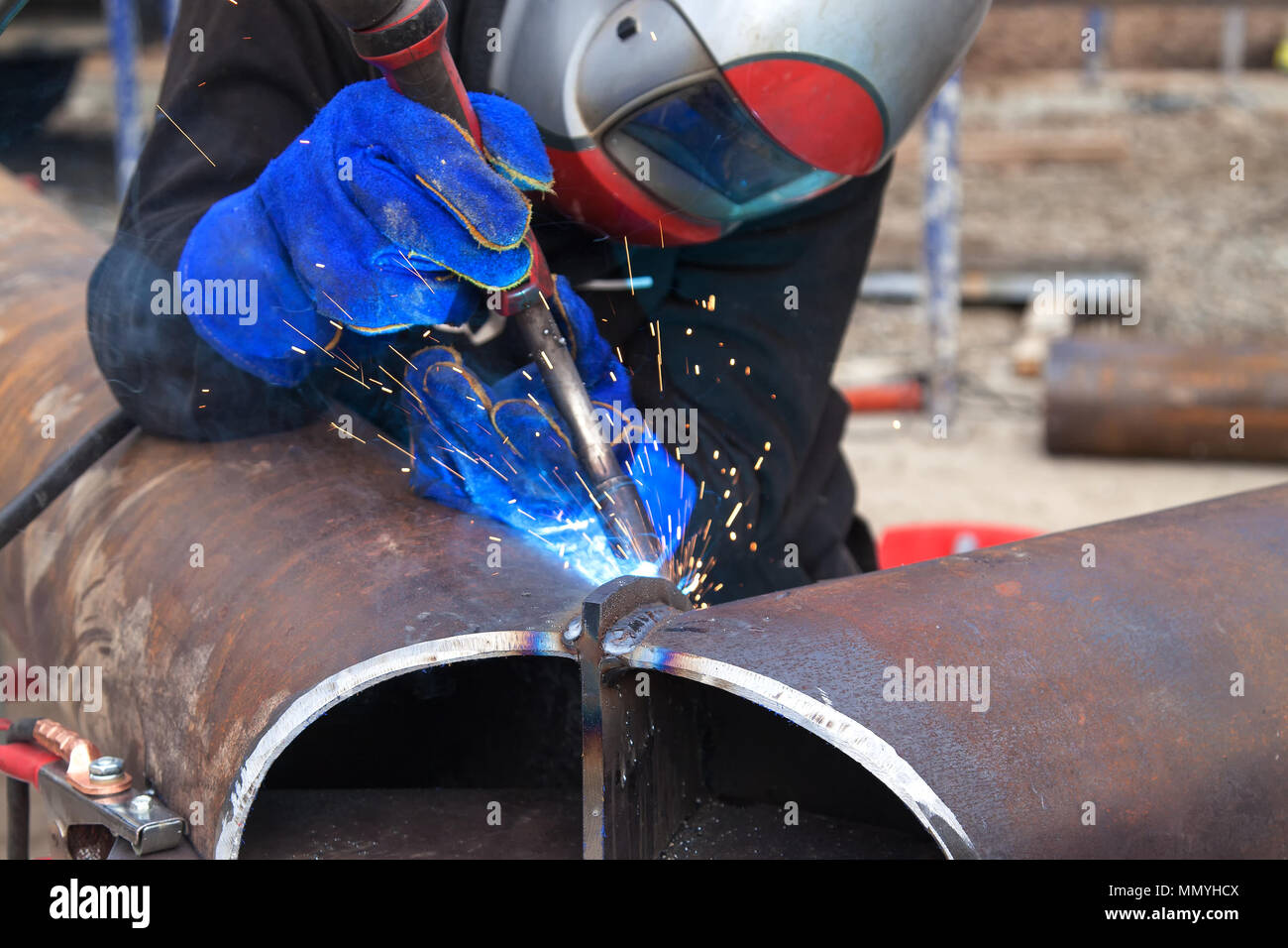 Welding work, welder welding metal material in heavy industry manufacturing, video clip Stock Photo