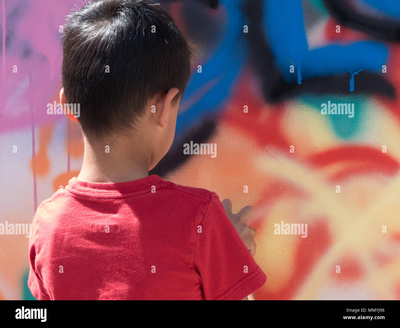 Street art graffiti child creating murals art education Stock Photo Alamy