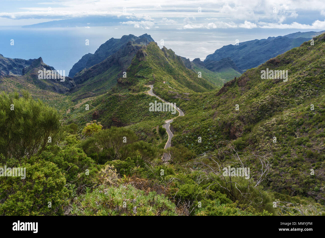 Hilly Landscape with winding road Stock Photo