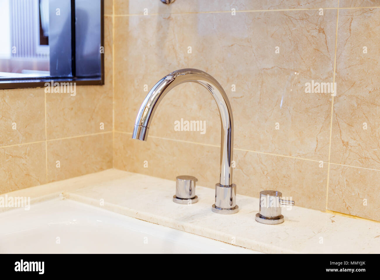 Bath-shower mixer tap on bath Stock Photo - Alamy