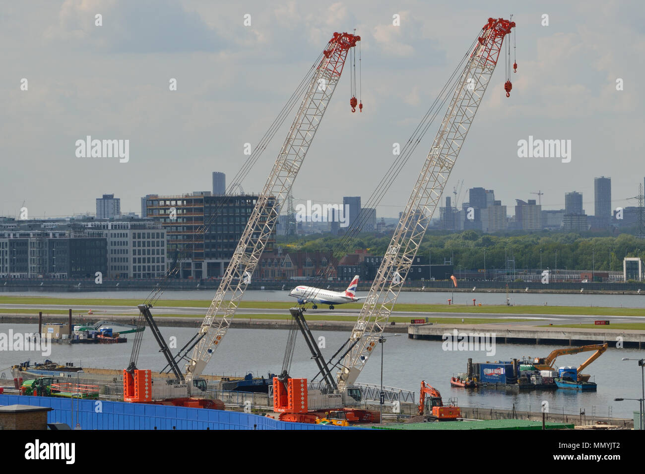 Two Crawler Cranes ready to be used as part of the London City Airport Development Project (CADP) in Newham, London Stock Photo