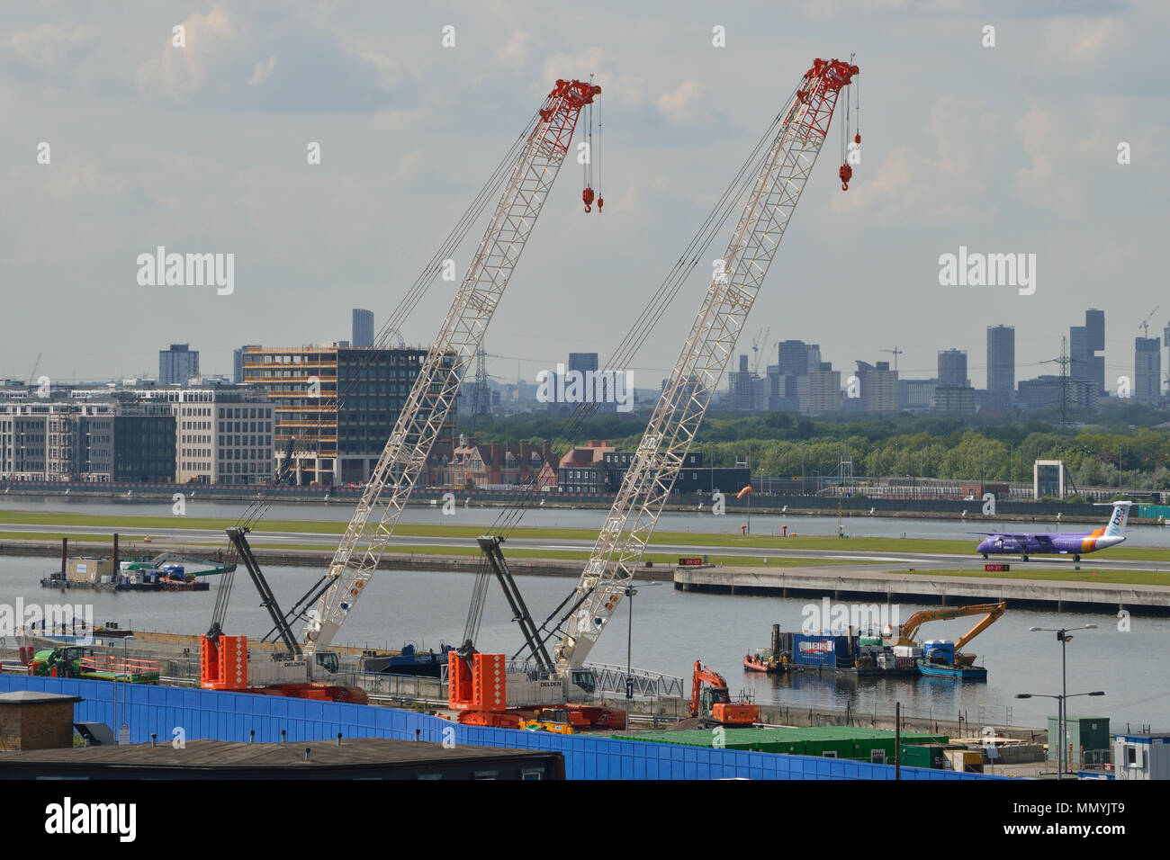 Two Crawler Cranes ready to be used as part of the London City Airport Development Project (CADP) in Newham, London Stock Photo