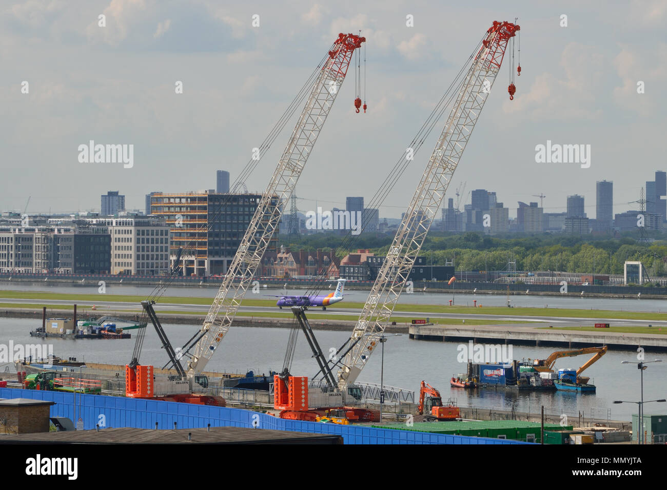 Two Crawler Cranes ready to be used as part of the London City Airport Development Project (CADP) in Newham, London Stock Photo