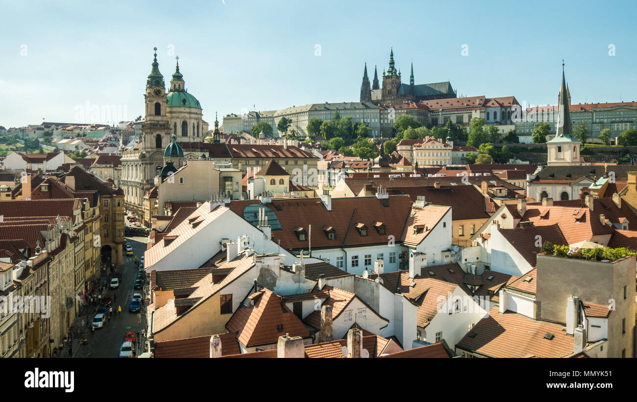 Prague, Czech Republic with Prague Castle (right) & St. Nicholas Bell Tower (left) Stock Photo