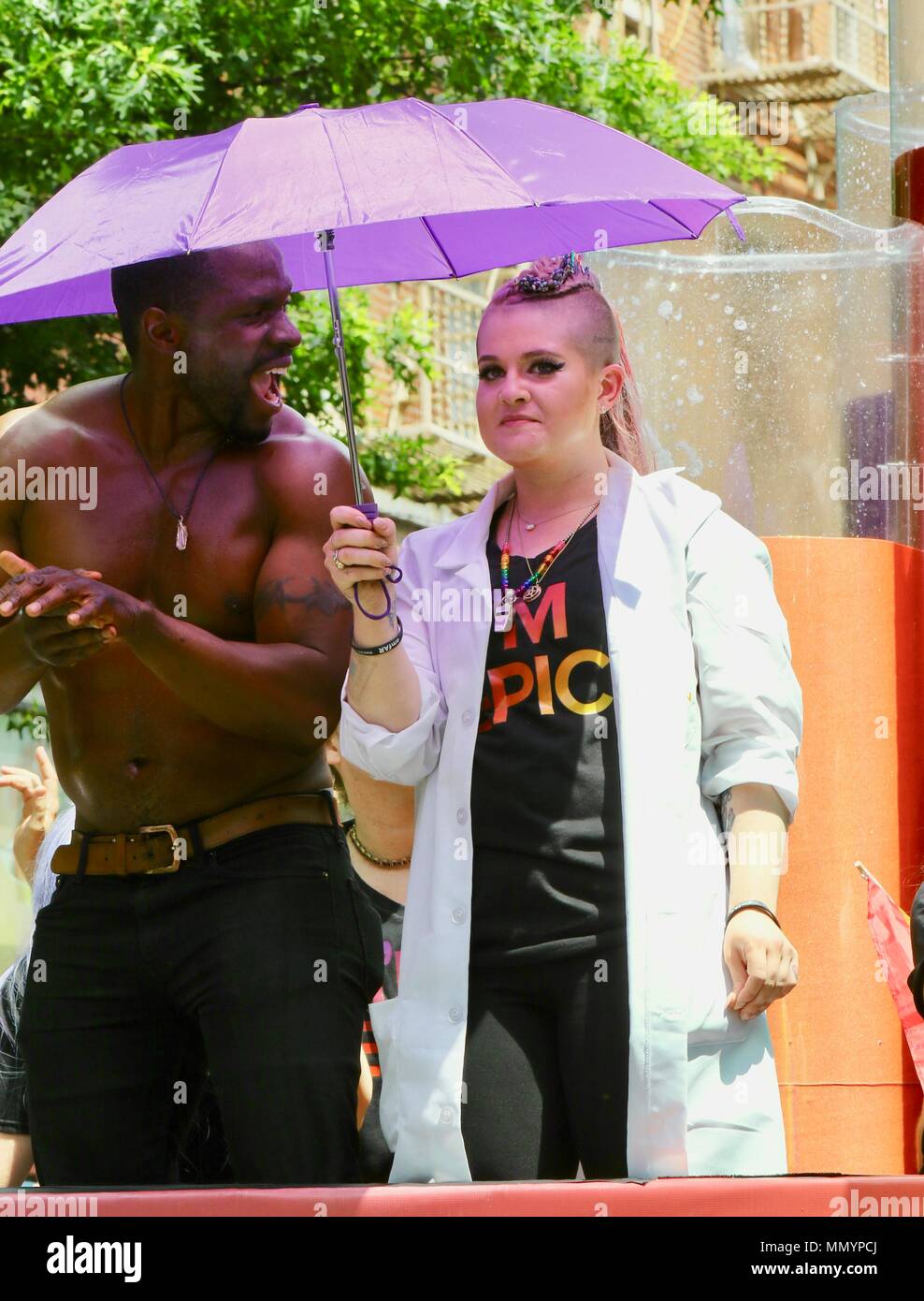 NEW YORK, NY - JUNE 25: Kelly Osbourne, Gbenga Akinnagbe attends during the 2017 Pride March in the West Village on June 25, 2017 in New York City   People:  Kelly Osbourne, Gbenga Akinnagbe Stock Photo