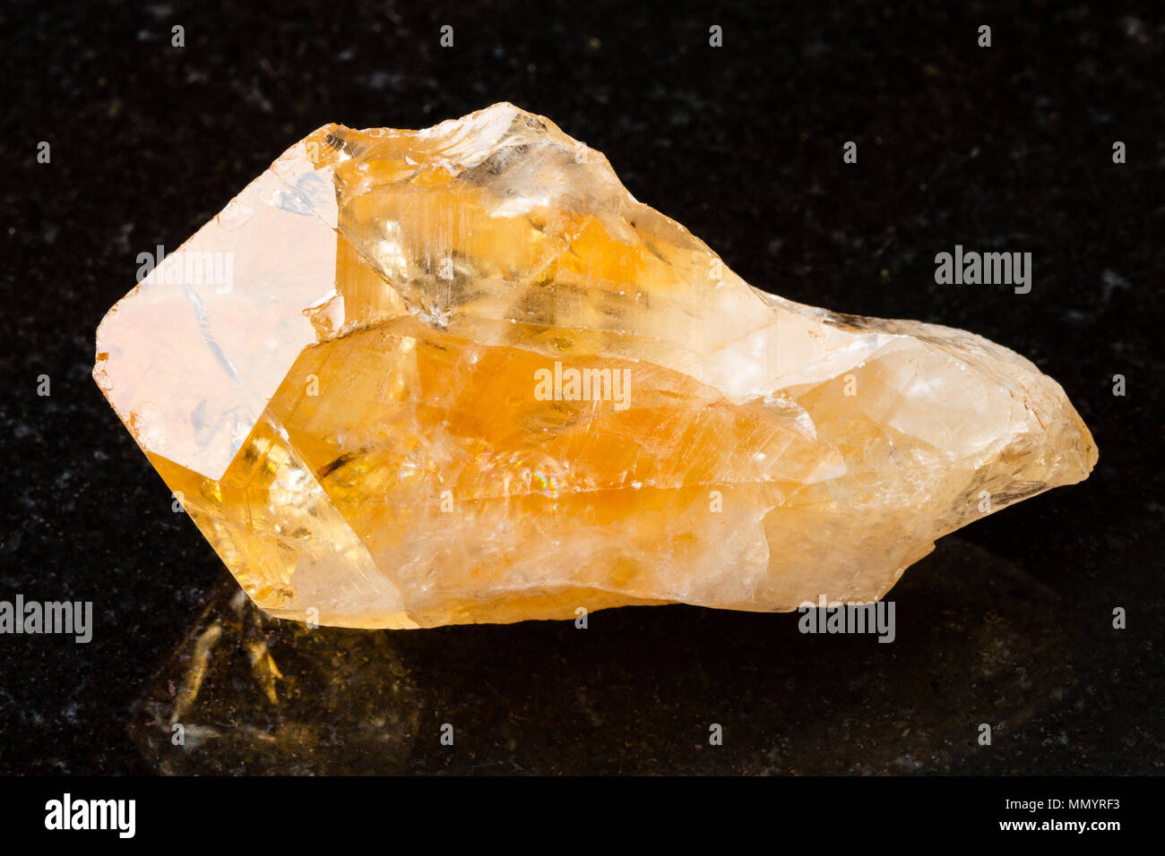 Macro Shooting Of Natural Rock Specimen Crystal Of Citrine Yellow Quartz Gemstone On Black Granite Background From Brazil Stock Photo Alamy