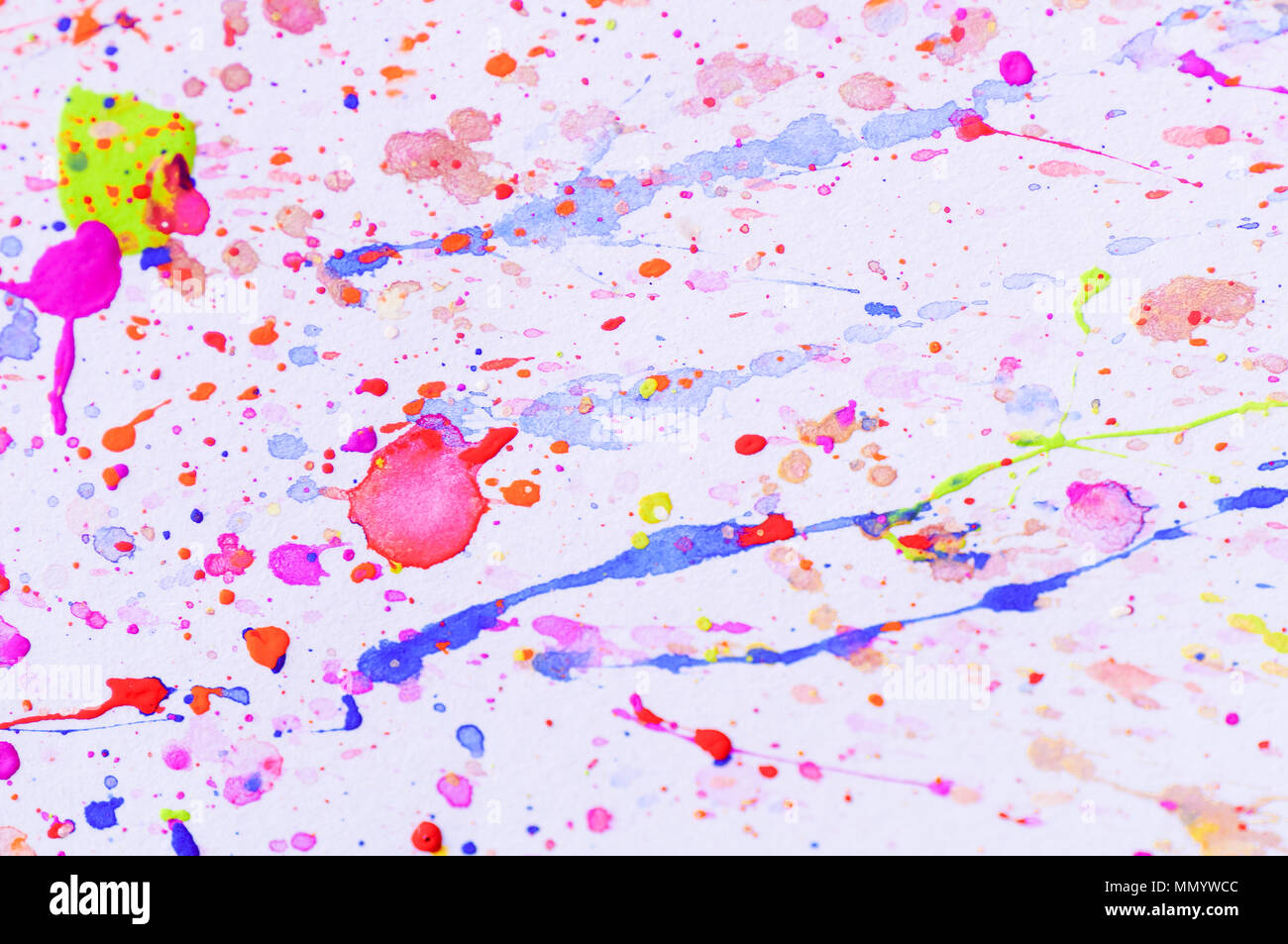 splash of watercolorin many color, pink, yellow, blue, purple and blue- concept in abstract paint paper background for artwork Stock Photo