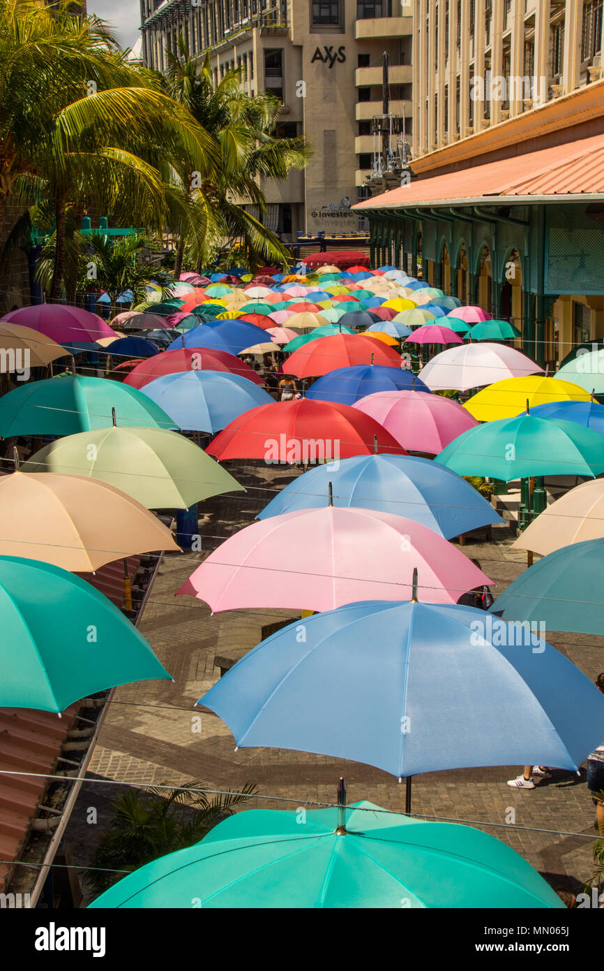Port Louis, Mauritius - unidentified tourists and shoppers enjoy a day out at the Le Caudan Waterfront shopping complex in the city Stock Photo