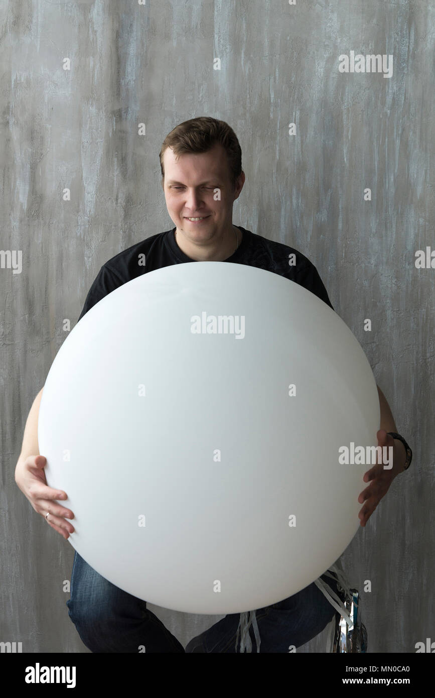 Man with oversized balls