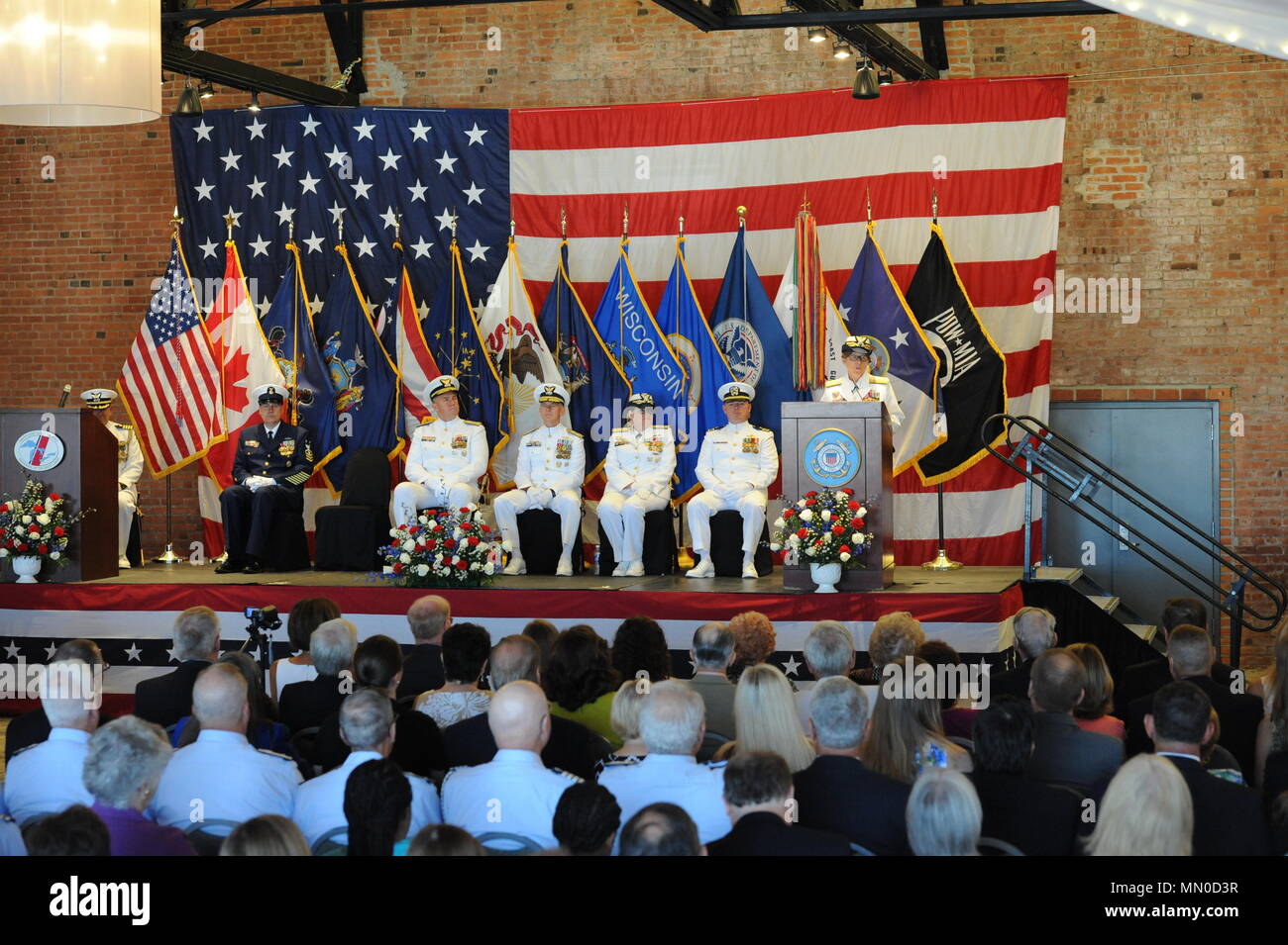 Rear Admiral Joanna Nunan gives her remarks as the newly