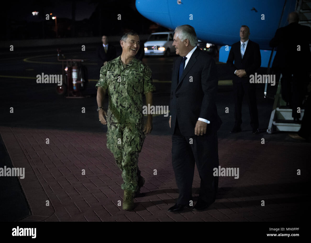 170803-N-ON707-063JOINT BASE PEARL HARBOR-HICKAM, Hawaii (August 3, 2017)— Adm. Harry Harris, Commander of U.S. Pacific Command (PACOM), welcomes U.S. Secretary of State Rex Tillerson after his arrival at Hickam Airfield. Secretary Tillerson is traveling to Manila, Bangkok, and Kuala Lumpur to meet with his counterparts and discuss a range of issues including the denuclearization of the Korean Peninsula, maritime security, and counterterrorism.  Secretary Tillerson’s travel reaffirms the Administration’s commitment to further broaden and enhance U.S. economic and security interests in the Indo Stock Photo