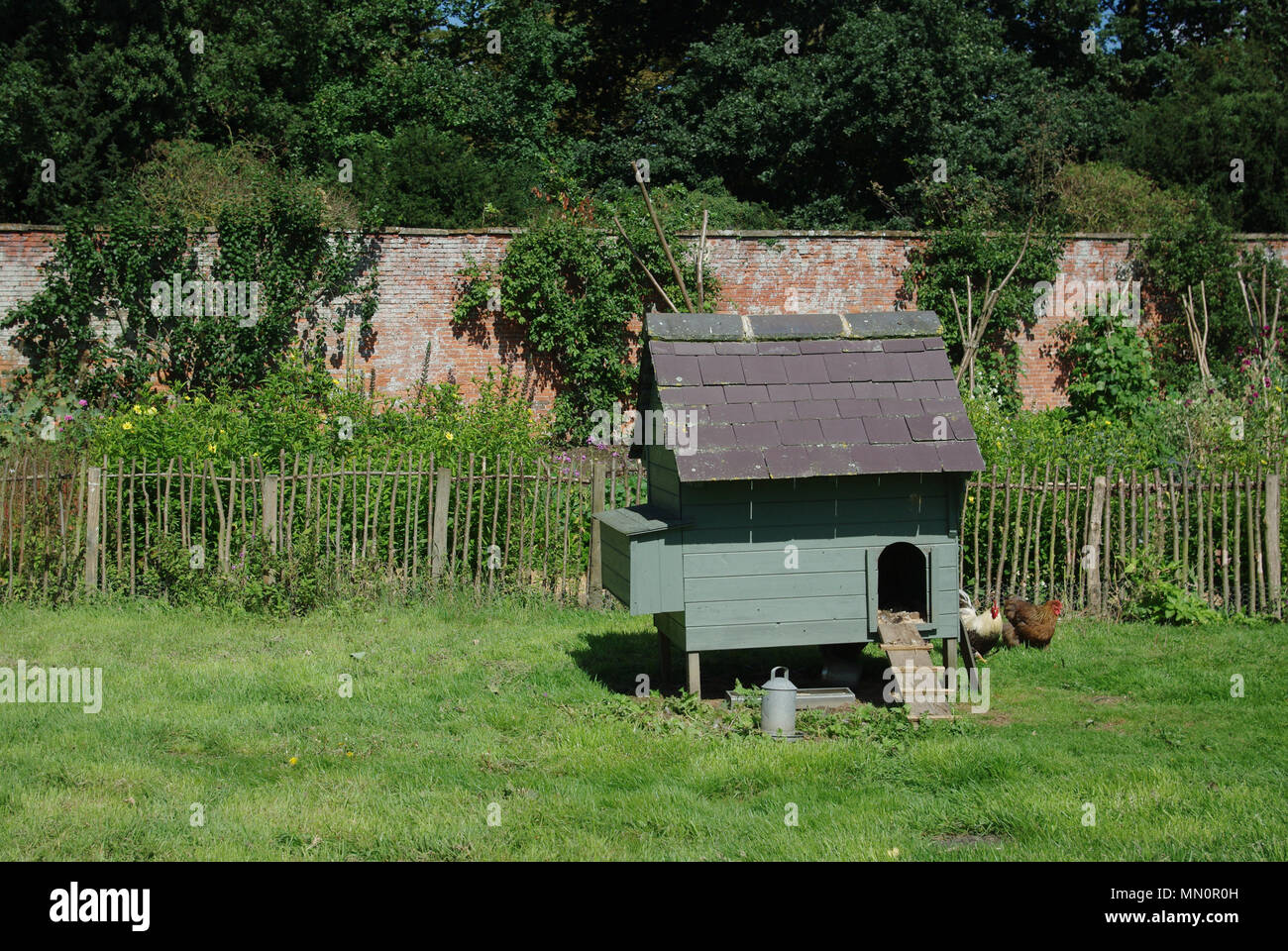 Portable green wooden hen house in the walled garden, Kelmarsh Hall