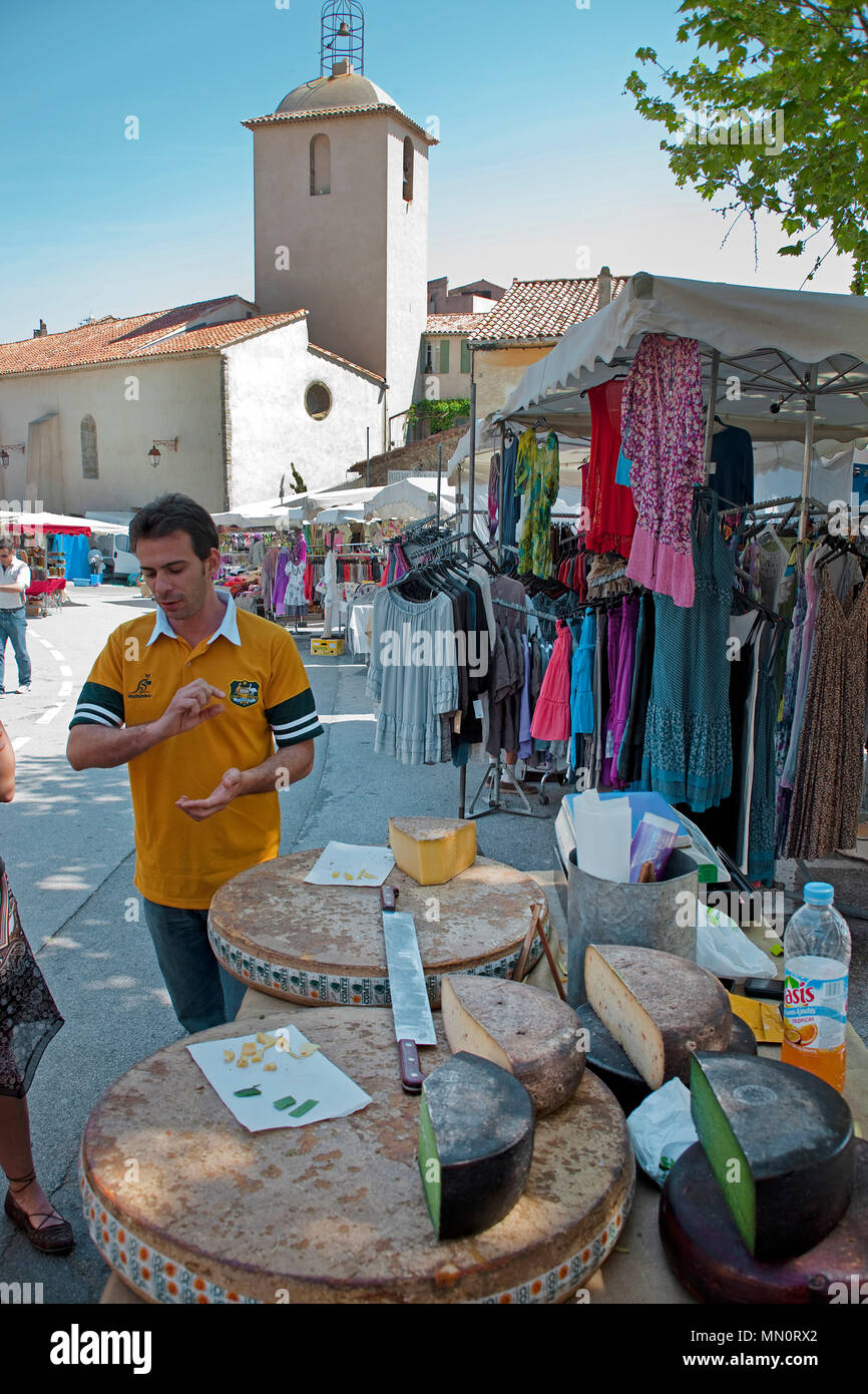 Cheese seller at street market, Ramatuelle, Cote d'Azur, Département Var, Provence-Alpes-Côte d’Azur, South France, France, Europe Stock Photo