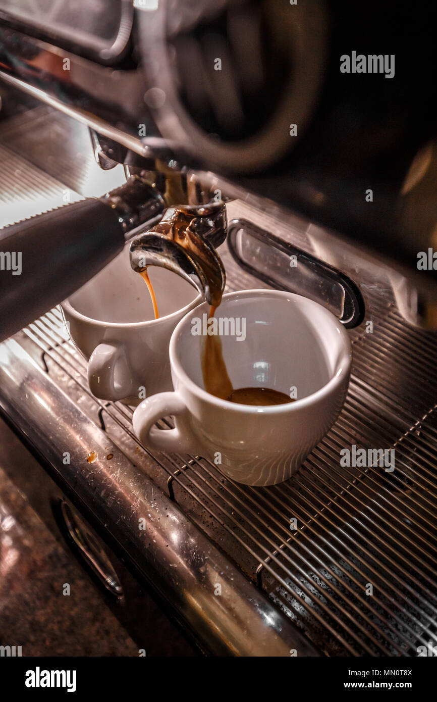 Espresso machine making coffee in pub, bar or restaurant Stock Photo