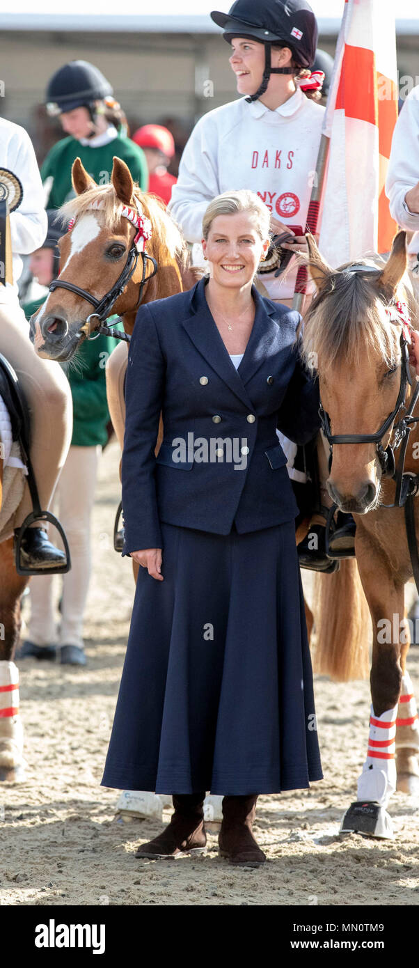 The Countess of Wessex with the winning team in the DAKS Pony Club Mounted games Royal Windsor Horse Show at Windsor Castle, Berkshire. Stock Photo