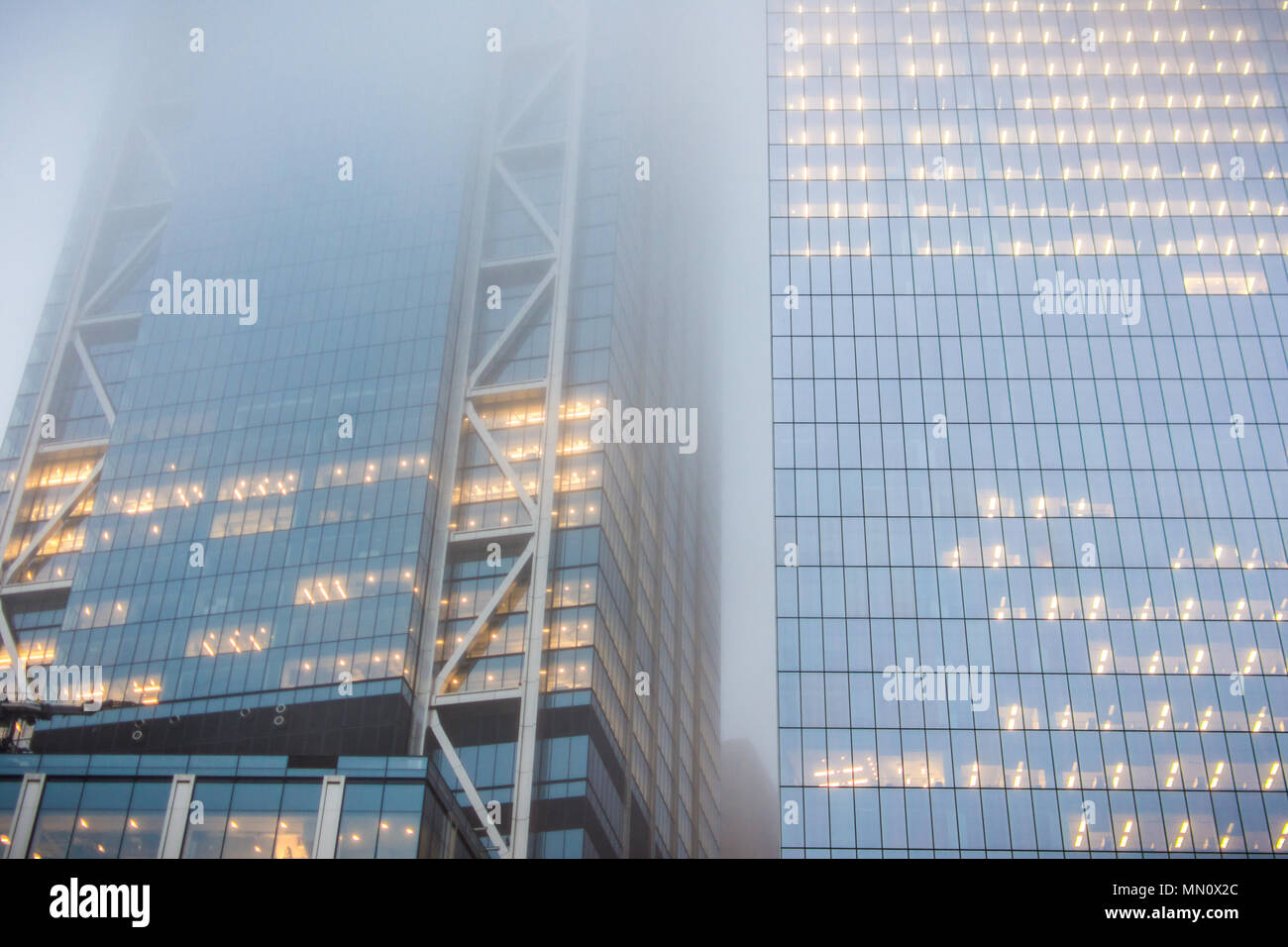 new York, US - March 29, 2018:  Skyscrapers seen through heavy fog in New York city Stock Photo