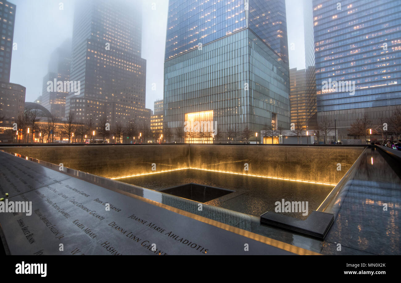 New York, US - March 29, 2018:  The famous world trade center under heavy fog at night in New York City Stock Photo