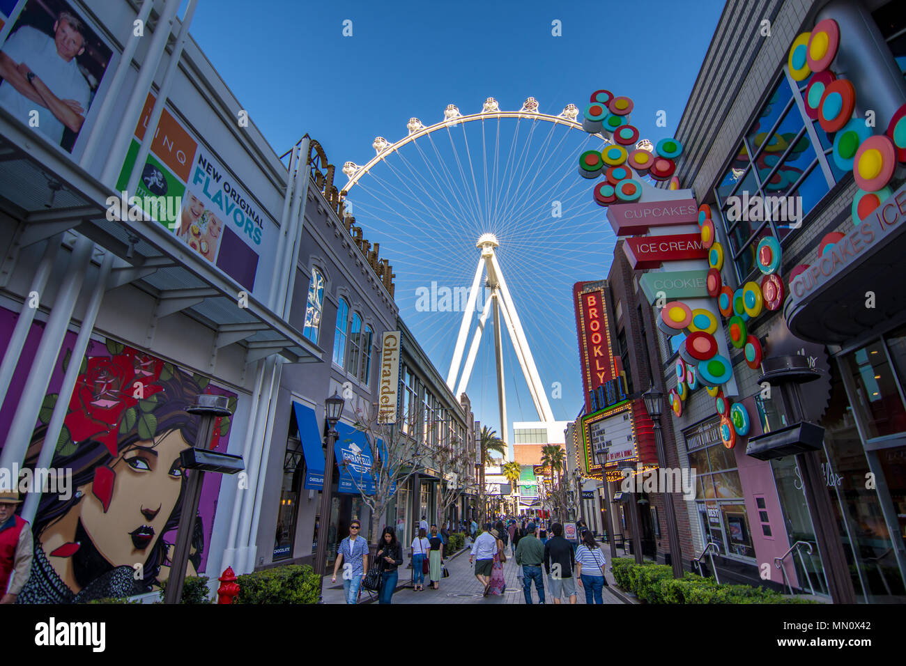 Las Vegas, US - April 27, 2018: Tourtists visting the LInq promenade and High roller in Las Vegas as seen on a sunny day Stock Photo