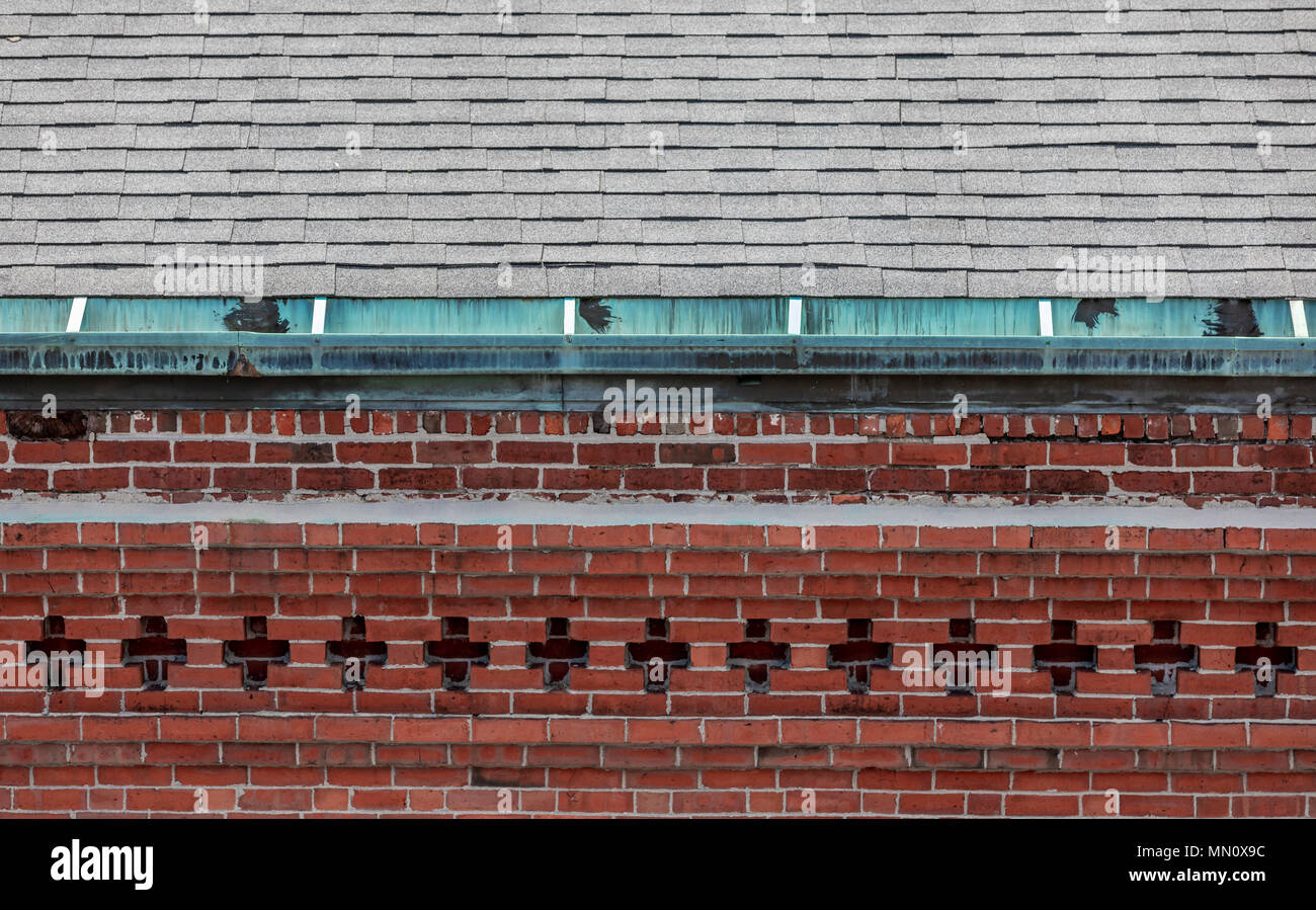detailed image of a the ornate exterior wall and roof of a Portland Maine building in the old wharf section of the city Stock Photo