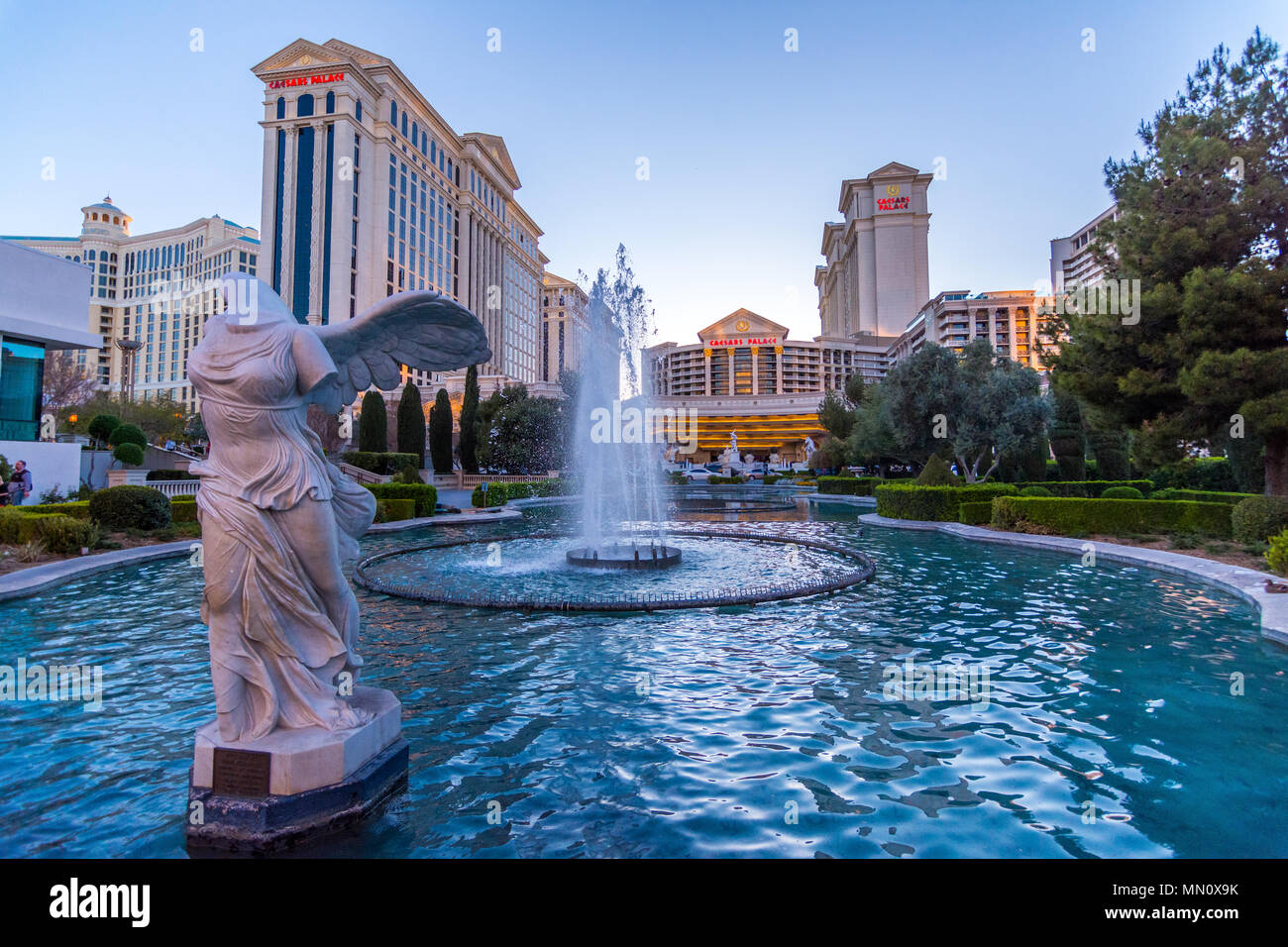 Las vegas, US - March 27, 2018: The exterior fountains at the Ceasar's palace hotel in Las Vegas as seen at dusk Stock Photo