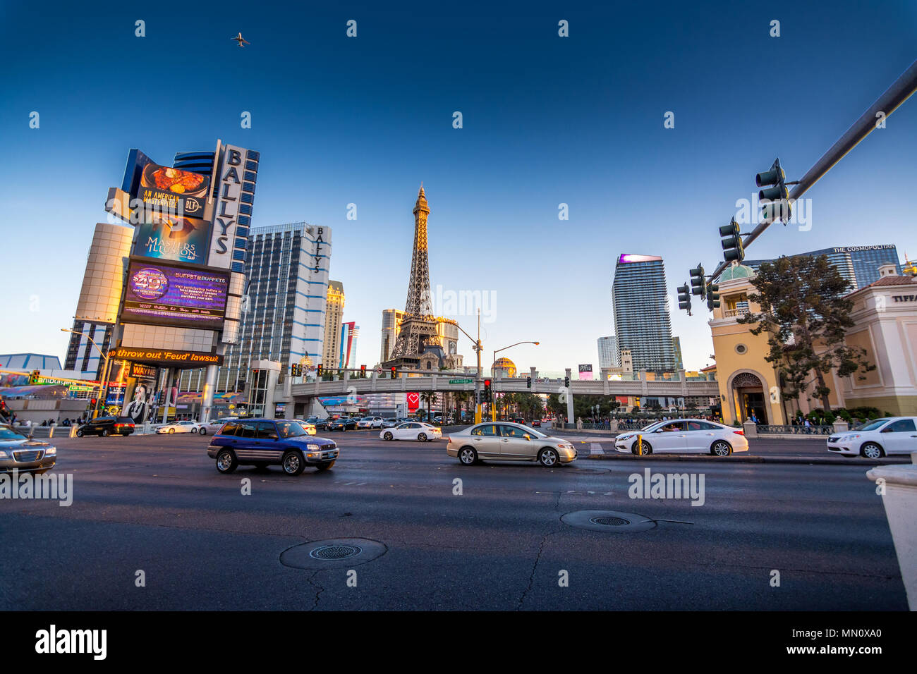 Las Vegas, US - April 28, 2018: Tourtists and traffic on Las vegas boulevard as seen at dusk Stock Photo