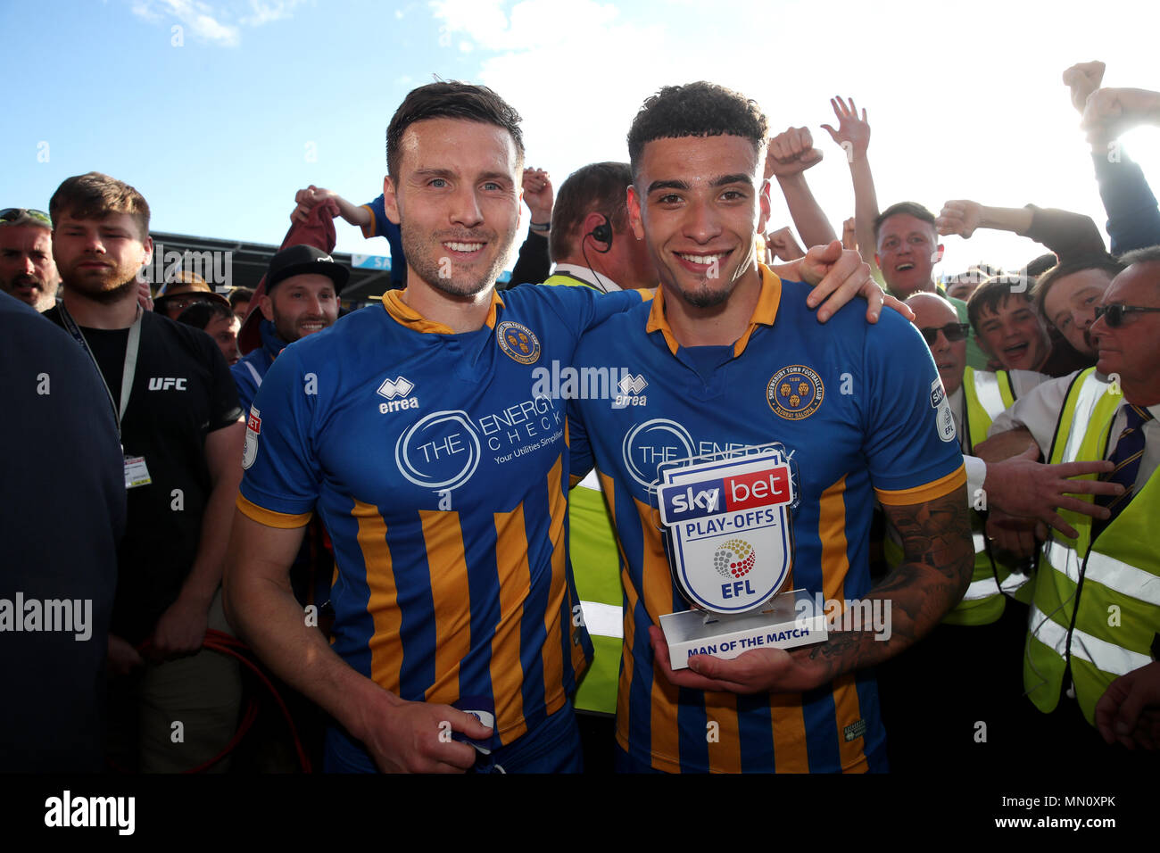 Shrewsbury Town's winner of the Man of the Match award Ben Godfrey (right) and Mat Sadler at the end of the Sky Bet League One play-off second leg match at Montgomery Waters Meadow, Shrewsbury. Stock Photo