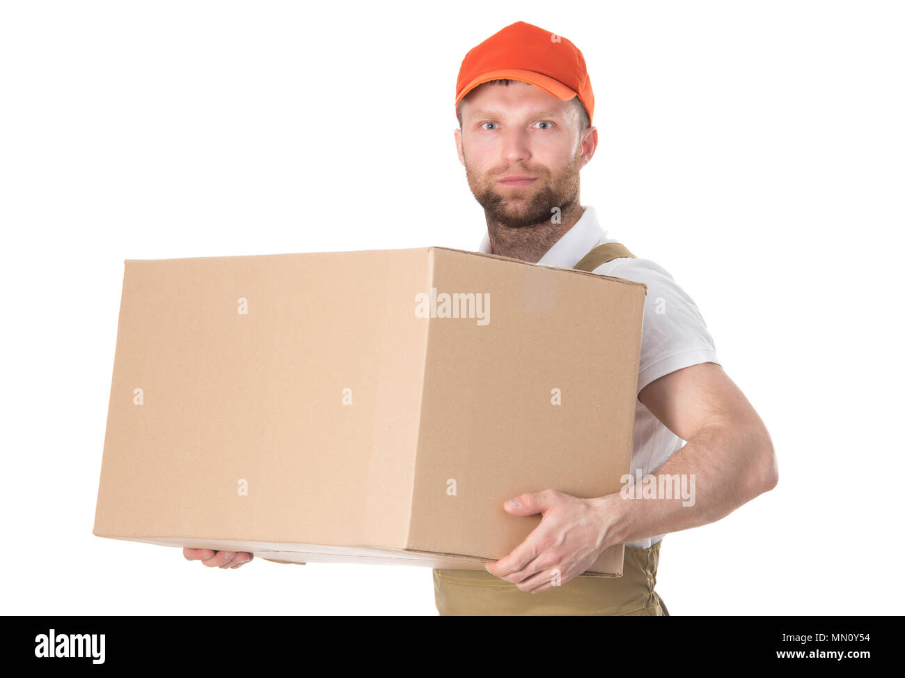 Goods delivery theme. Courier holding box isolated on white background. Stock Photo