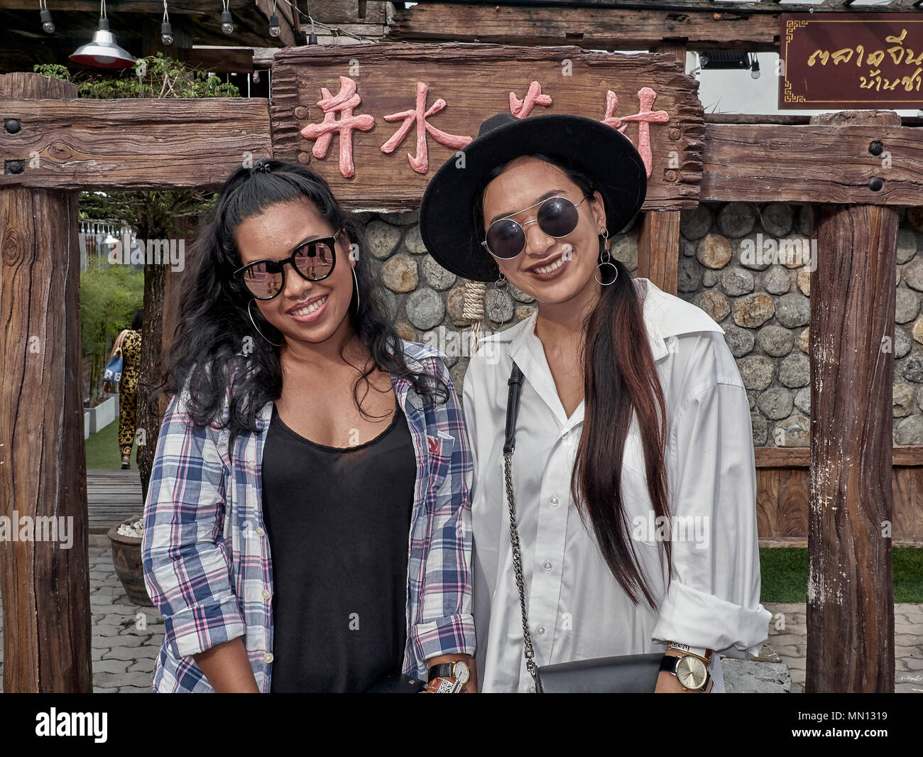 Two women posing for hi-res stock photography and images - Alamy