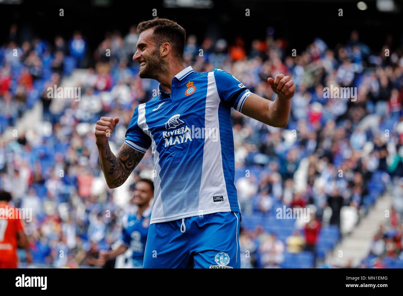 Barcelona, Spain. 13th May, 2018. RCD Espanyol's Leo Baptistao celebrates  his goal during a Spanish league match between RCD Espanyol and Malaga in  Barcelona, Spain, on May 13, 2018. RCD Espanyol won