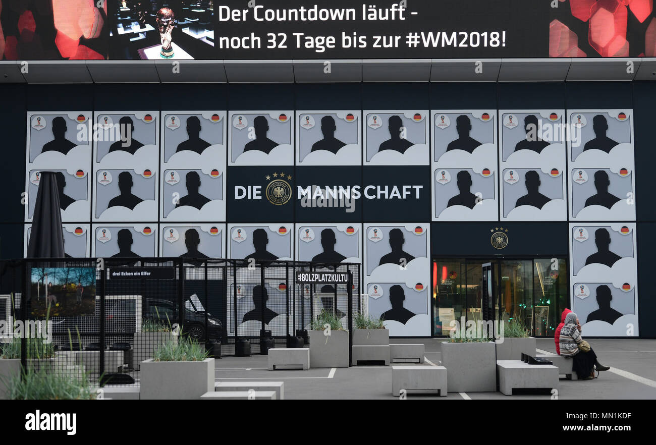 13 May 2018, Germany, Dortmund: 26 huge silhouettes can be seen on the glass facade of the German Football Museum. On Tuesday, German soccer national team's coach Loew announces the preliminary squad for the 2018 FIFA World Cup in Russia. Photo: Ina Fassbender/dpa Stock Photo