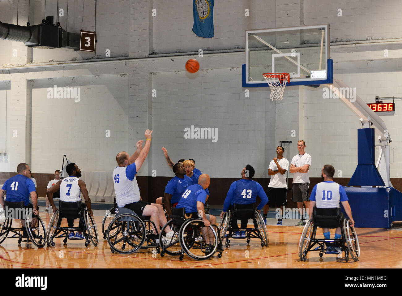 Wounded warriors play wheelchair basketball in the Offutt Field House